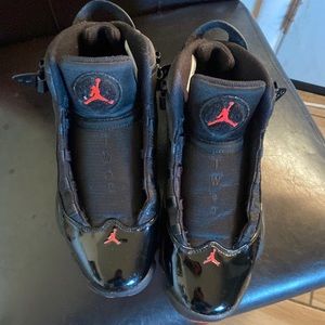 Orange and black Jordan’s size 9